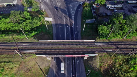 aerial view of empty double-track railway line leading through town