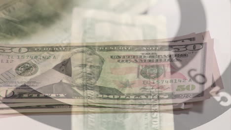 animación de la mano contando billetes de dólar estadounidense girando sobre el ojo del toro