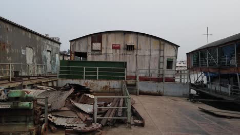 Debris-on-a-terminal,-wharf,-buriganga-river,-boat,-shipping,-trash