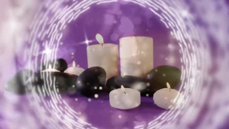 Animación-De-Puntos-De-Luz-Blanca-Sobre-Velas-Y-Piedras-Encendidas.