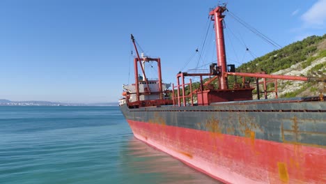 abandoned cargo ship in coastal waters