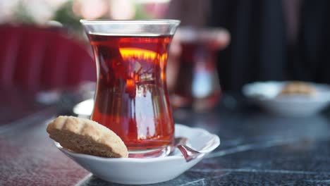 turkish tea and cookies at an outdoor cafe