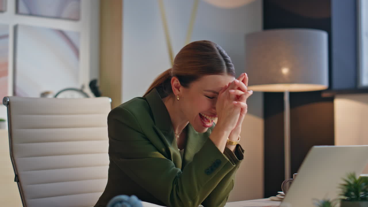 Happy businesswoman rejoicing achievement in office closeup. Excited winner lady
