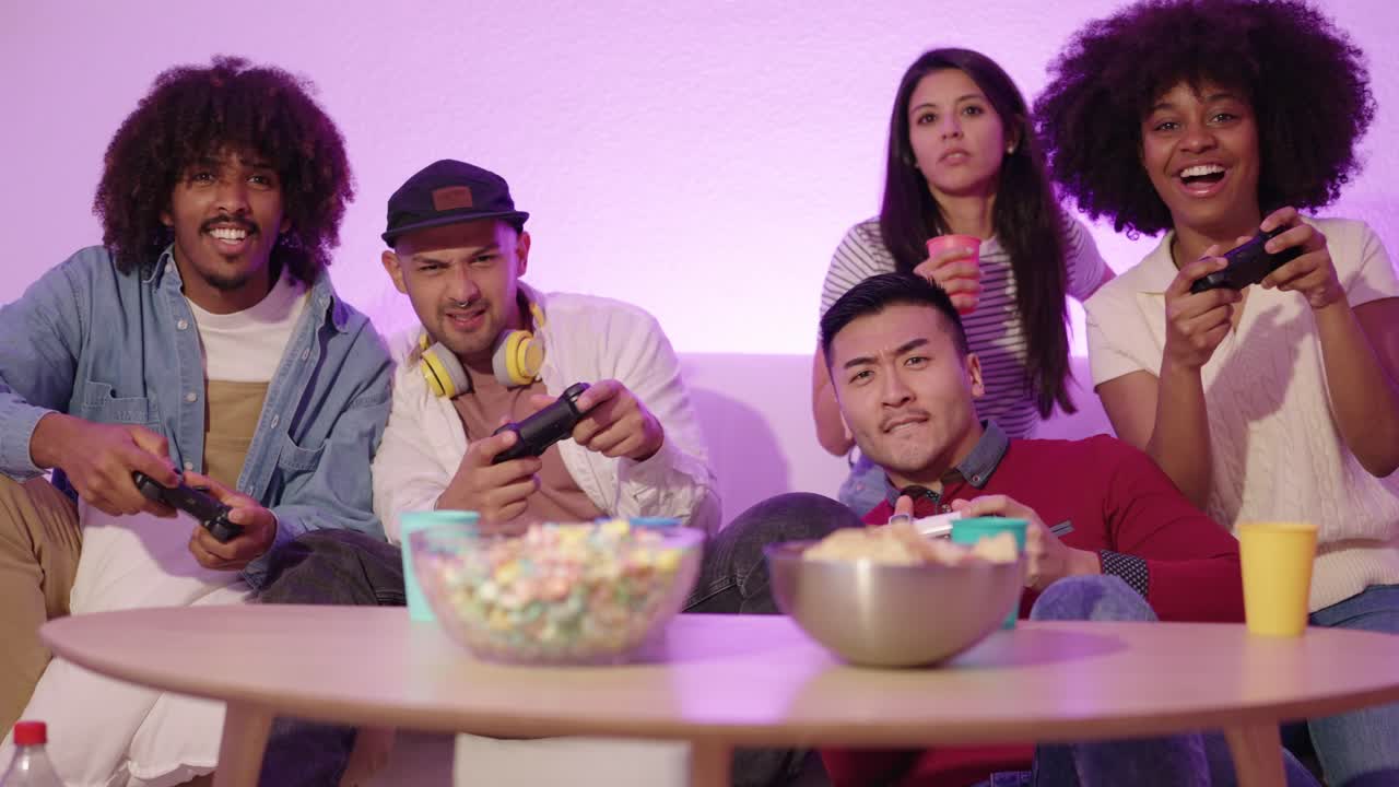 Group of friends playing video games together