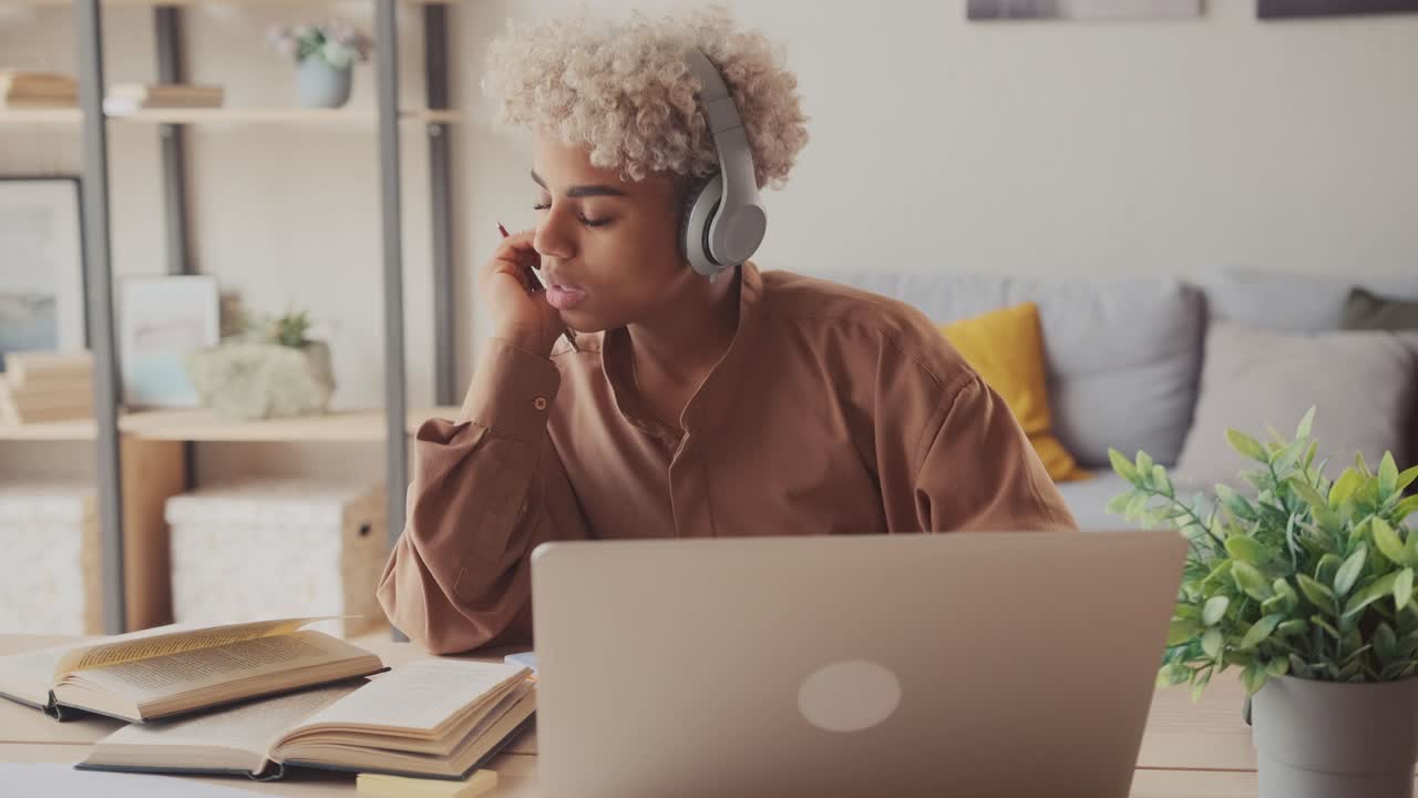 Afro business woman student teacher tutor wear wireless headset video conference