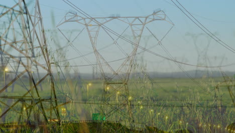 road traffic and electricity pylons 4k