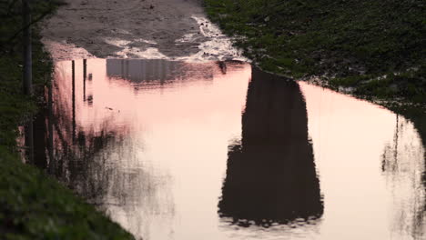 The-cool-and-calm-receded-flood-waters-in-Leiria,-Portugal---mid-shot