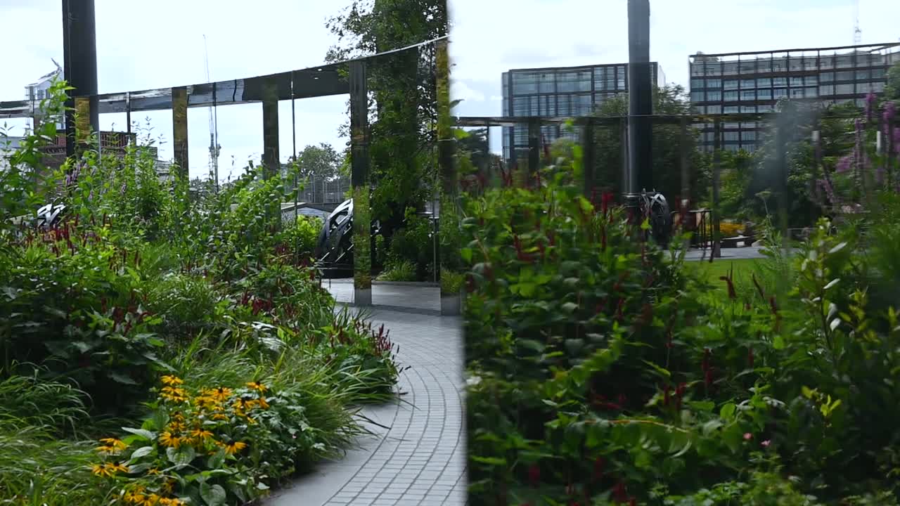Looking through the glass within the Gasholder Park, Regents Canal Path, London, United Kingdom