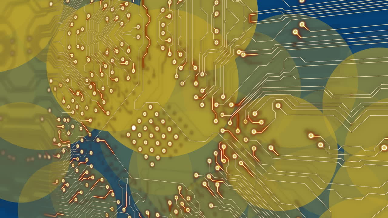 Animation of yellow dots over integrated circuit on blue background