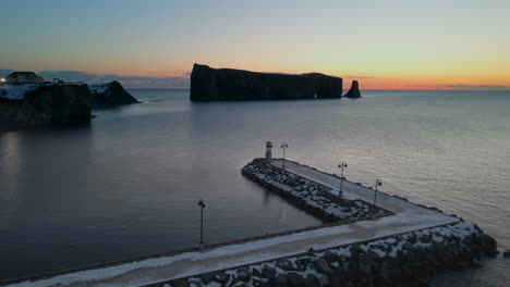 Cinematic-drone-shot-of-famous-Perce-rock-in-Quebec,-Canada