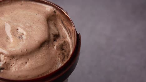 chocolate ice cream in a container