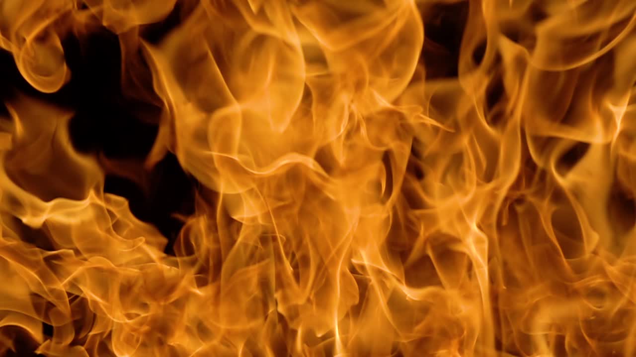Flames of fire on black background in slow motion