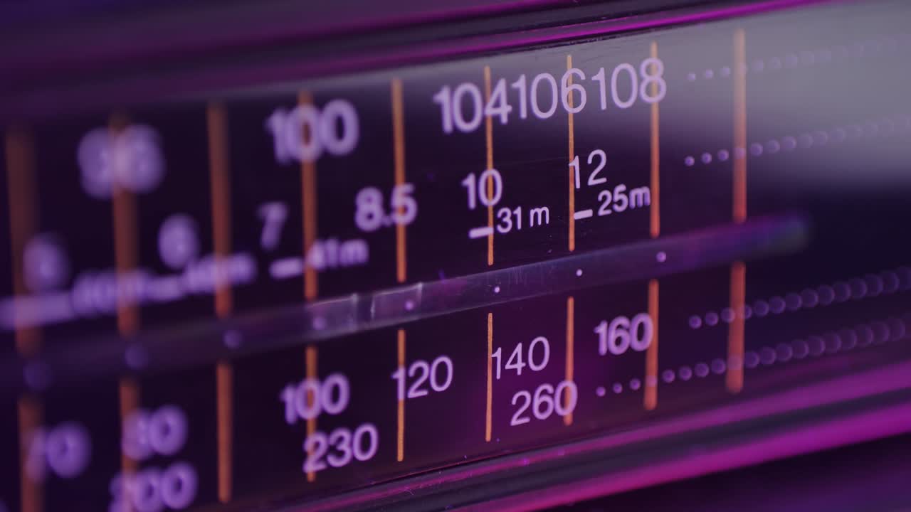 Retro radio tape recorder close-up. Listening to music, old radio boombox player, searching channel.