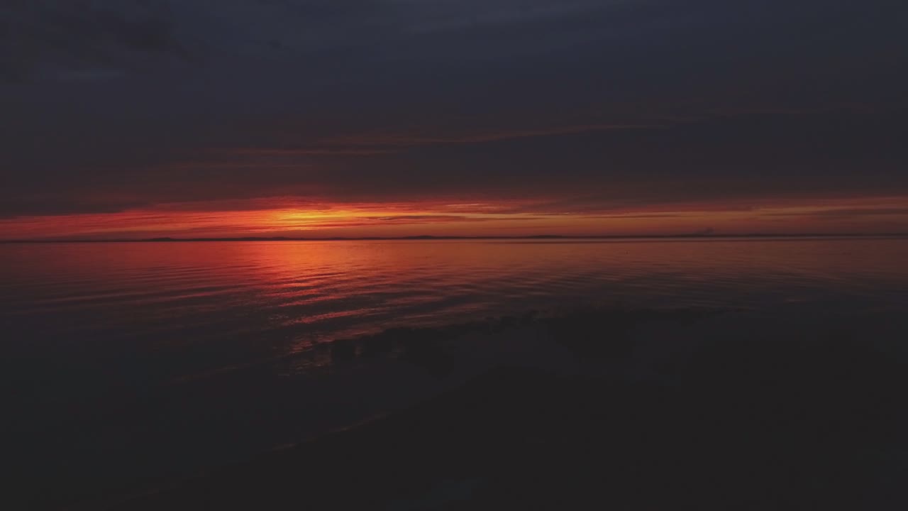 Kurische Nehrung und Haff bei spätem Sonnenuntergang