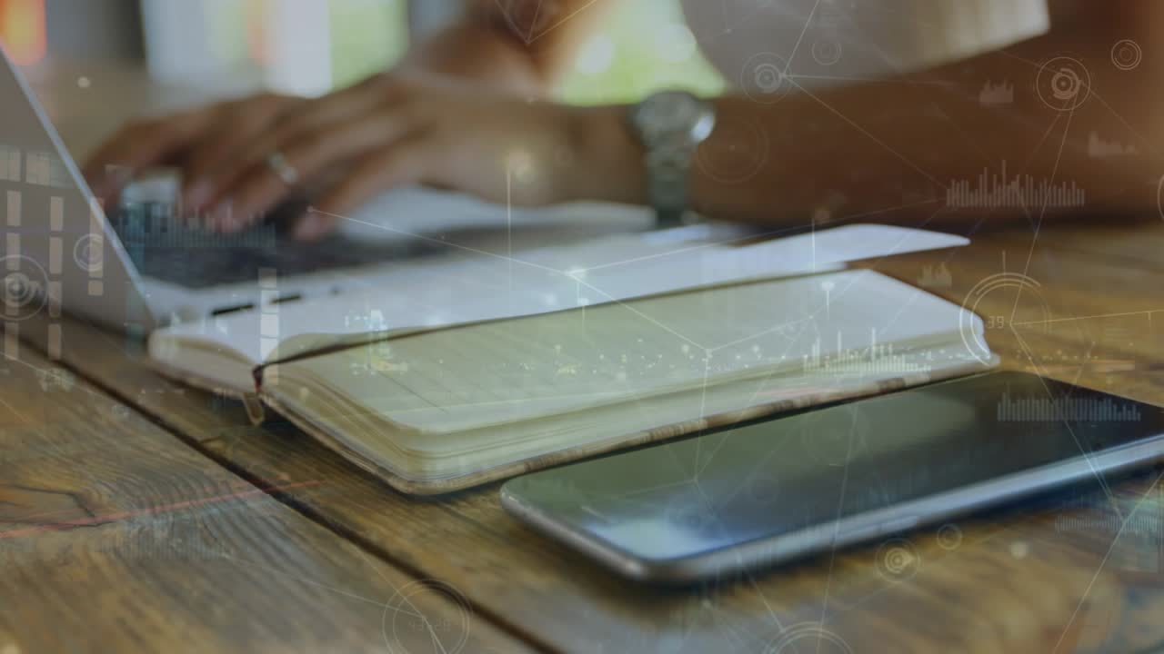 Animation of connections over hands of woman using laptop and smartphone lying on desk