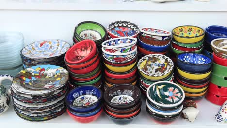 assortment of colorful turkish ceramic bowls and plates