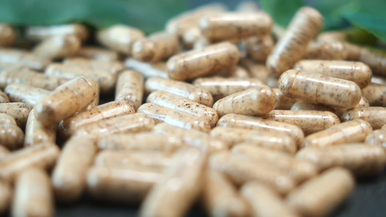 Pile of Brown Capsules
