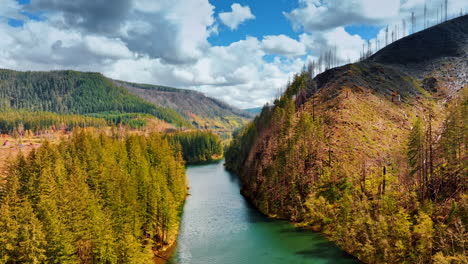 going up over the river in mountains with sea-blue water. scenic view on the rocky landscape in oregon state, the usa on sunny daytime. mt. hood national forest.