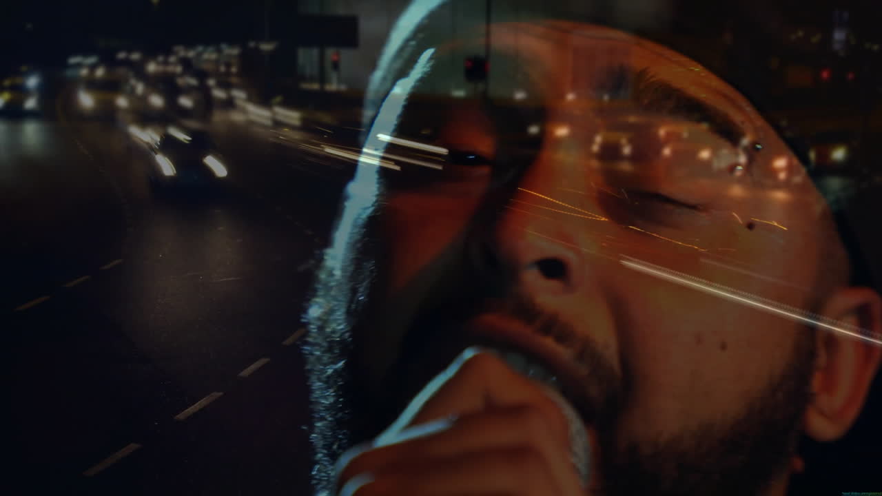 Man shaving in studio-urban composite, with streaming light trails illustrating technology concept