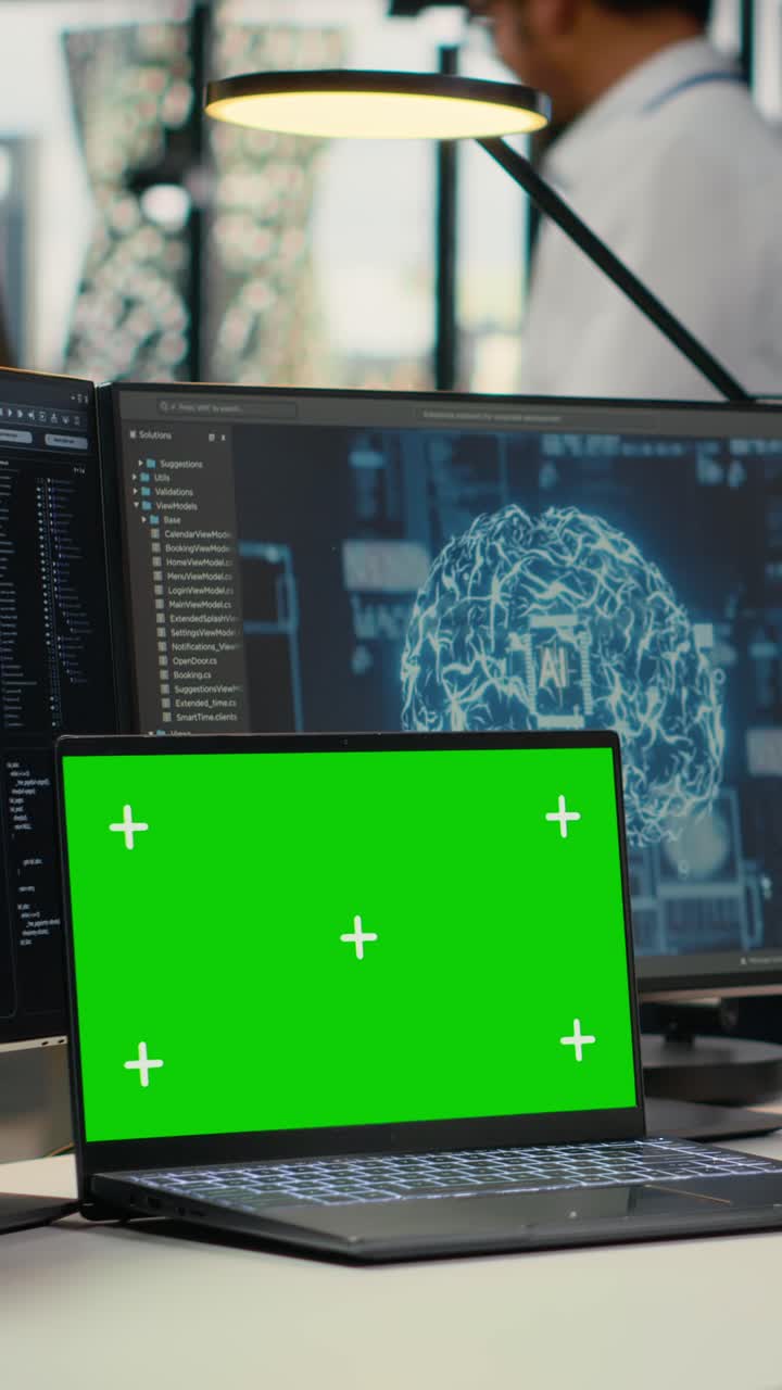 Vertical video Isolated screen PC used by admin in office, using AI specialized hardware
