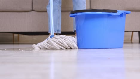 woman mopping the floor