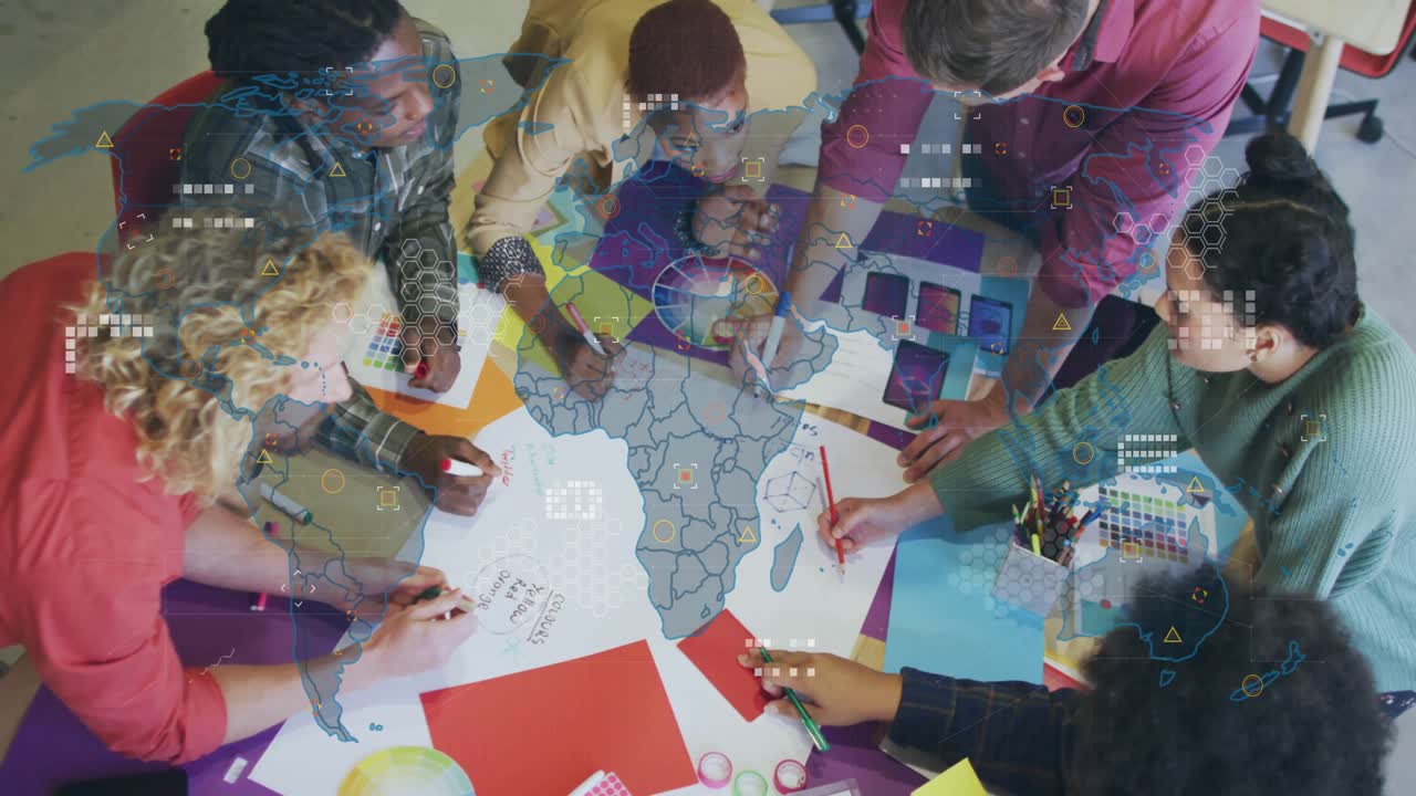 Design team arranging colors on Africa map to map data, sketching boundaries under animated overlay