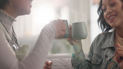 two women having coffee and chatting