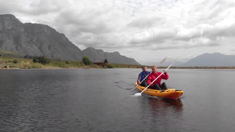 animation of caucasian people grumbling in a yellow canoe, montains and white clouds