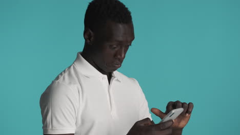 african american man on blue background.
