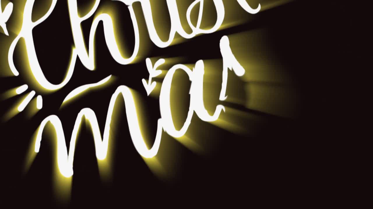 animación de felicitaciones de navidad texto en letras amarillas y blancas sobre fondo negro