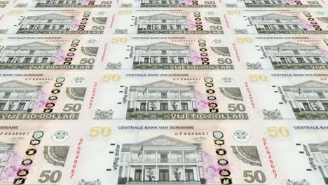 banknotes of fifty surinamese dollars of suriname, cash money, loop