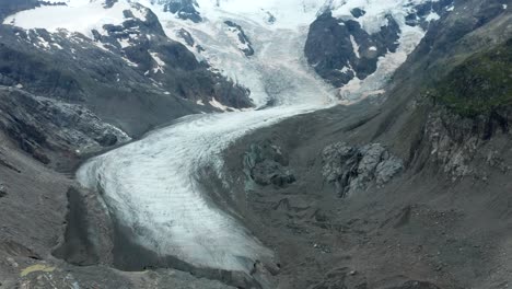 flight over the majestic morteratsch glacier in the swiss alps