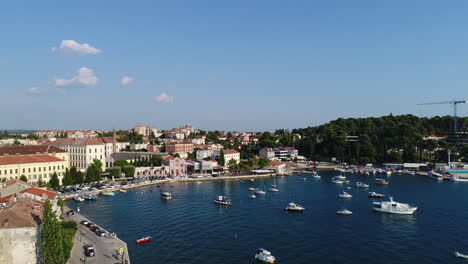 360 degrees drone shot of an old city in croatia at the sea, 4k uhd