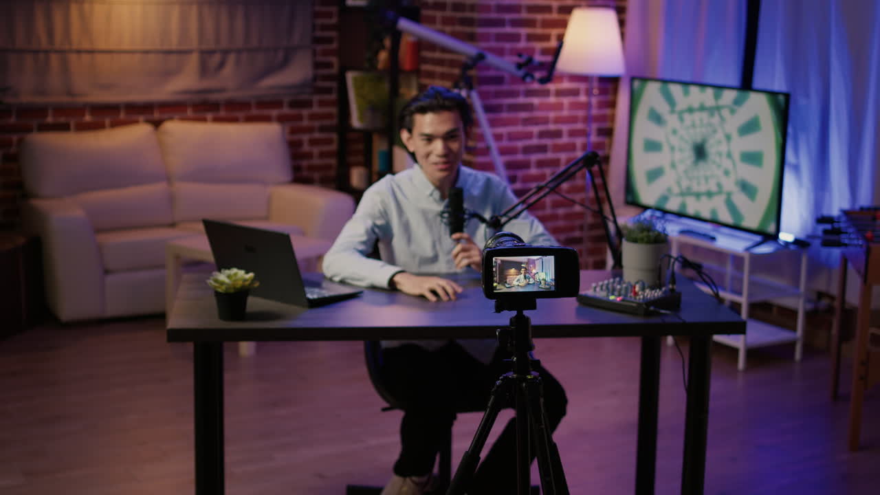 Man recording a podcast in his studio