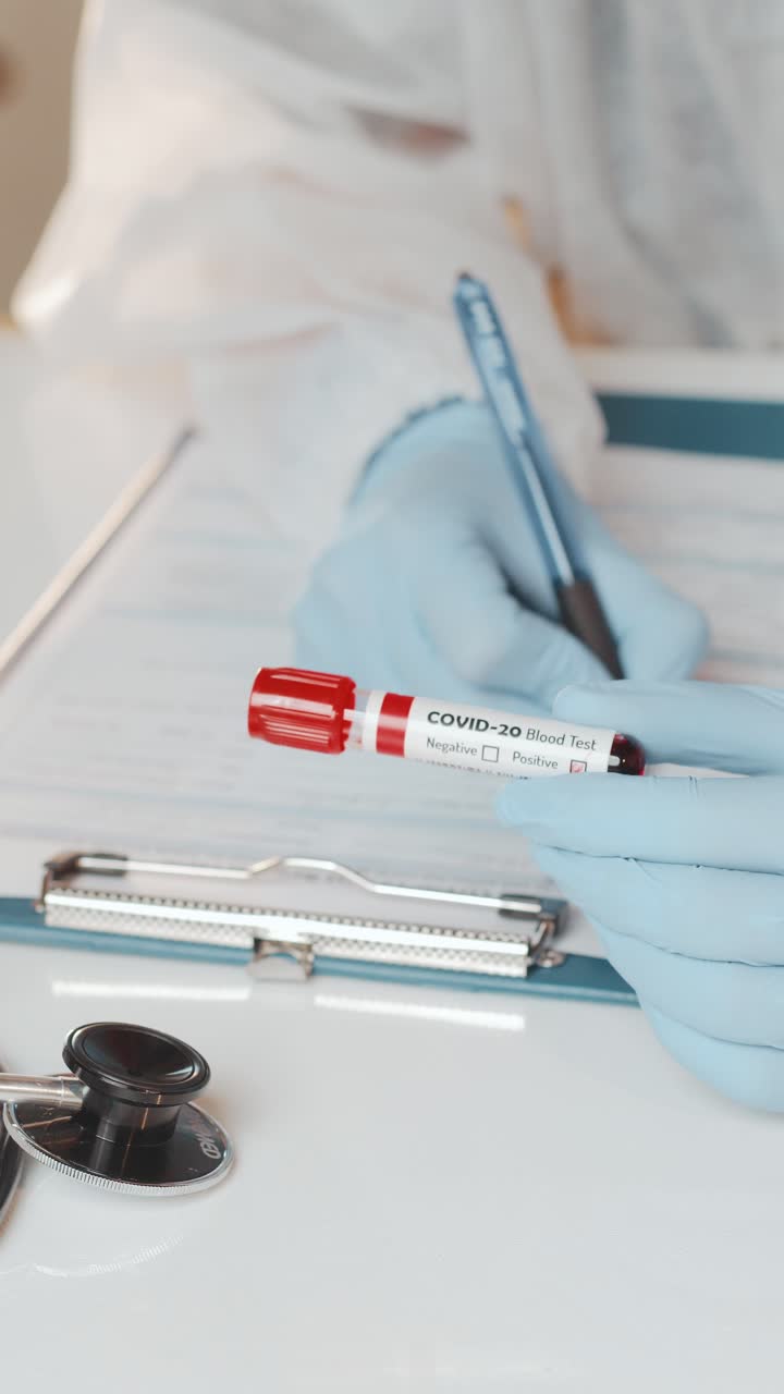 Doctor administers covid20 blood test with care in clinic