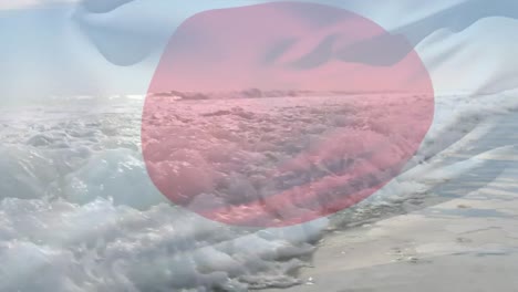 Digital-composition-of-japan-flag-waving-against-aerial-view-of-waves-in-the-sea