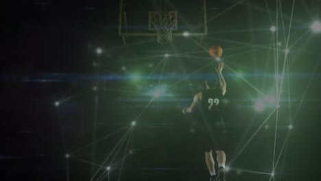 animation of networks of connections over mixed race male basketball player at gym