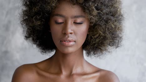 portrait of a woman with curly hair