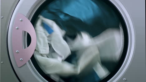 Drying-laundry-clothes.-Drying-machine.-Closeup-of-industry-washing-machine