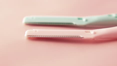 plastics woman razors and shaving blade on table