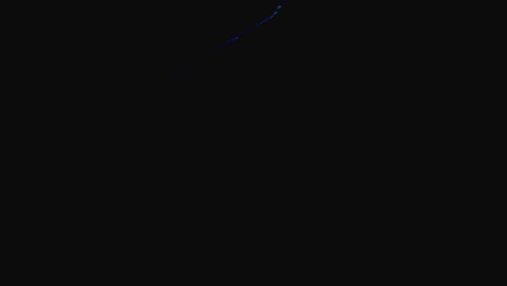 machineguns on the dark background and in blinking red and blue light are falling in slowmotion
