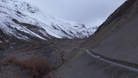 mountain road through snowy valley