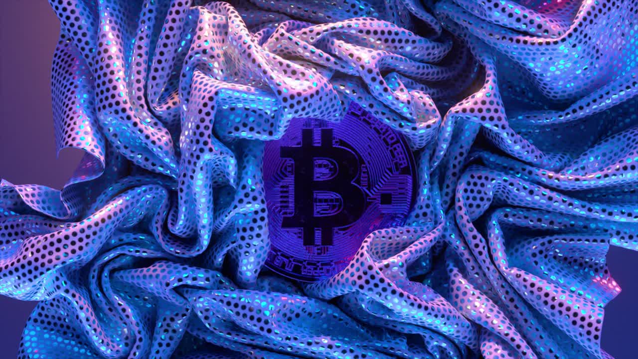 bitcoin envuelto en una tela drapeada