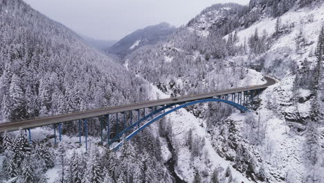 winter's lullaby: aerial view of tranquil traffic over paulson bridge