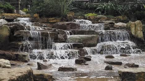 slow motion of waterfall in a natural park singapore ,