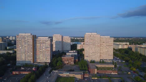 Amazing-aerial-top-view-flight-Panel-system-building,-prefabricated-housing-complex,-Berlin-Marzahn-East-Germany-golden-hour-2023