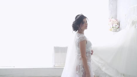 slow-motion-young-bride-in-long-transparent-lacy-dressing