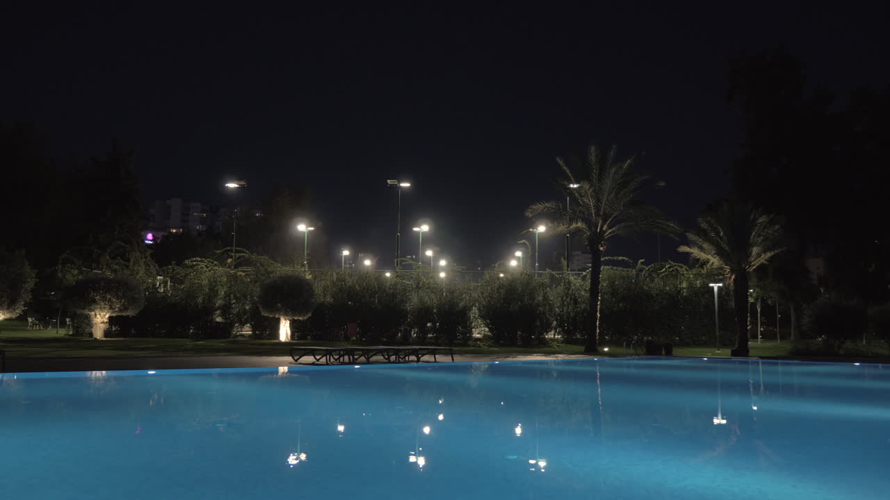 Outdoor pool on hotel area night view
