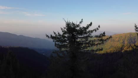 sunrise on the mountain looking at the valley in kashmir