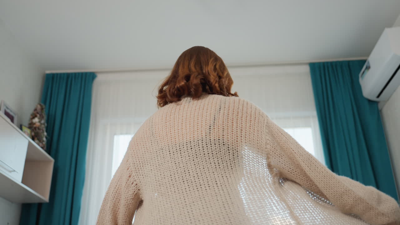 Relaxed Model Showcases Bright Room, Chic Individual Confidently Strides Through Sunlit Modern Living Space, Fashionable Person In Cozy Attire Navigates Welllit Contemporary Home Interior